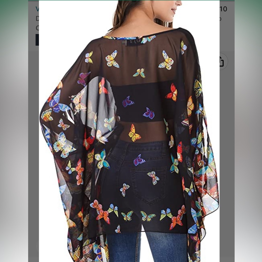 Brand new with tags Flowy semi sheer black top with butterfly deco